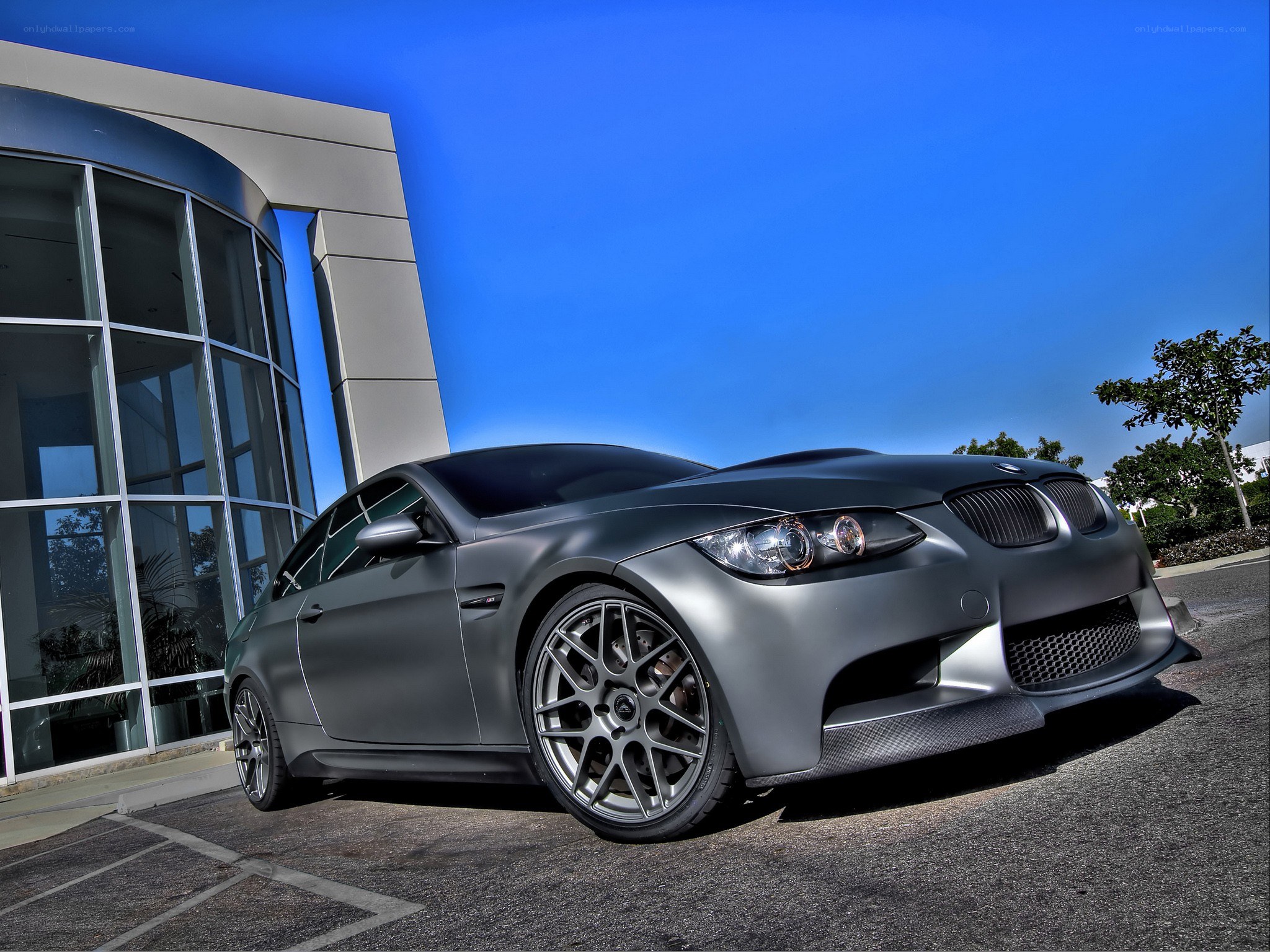 Matte gray BMW M3 parked outside