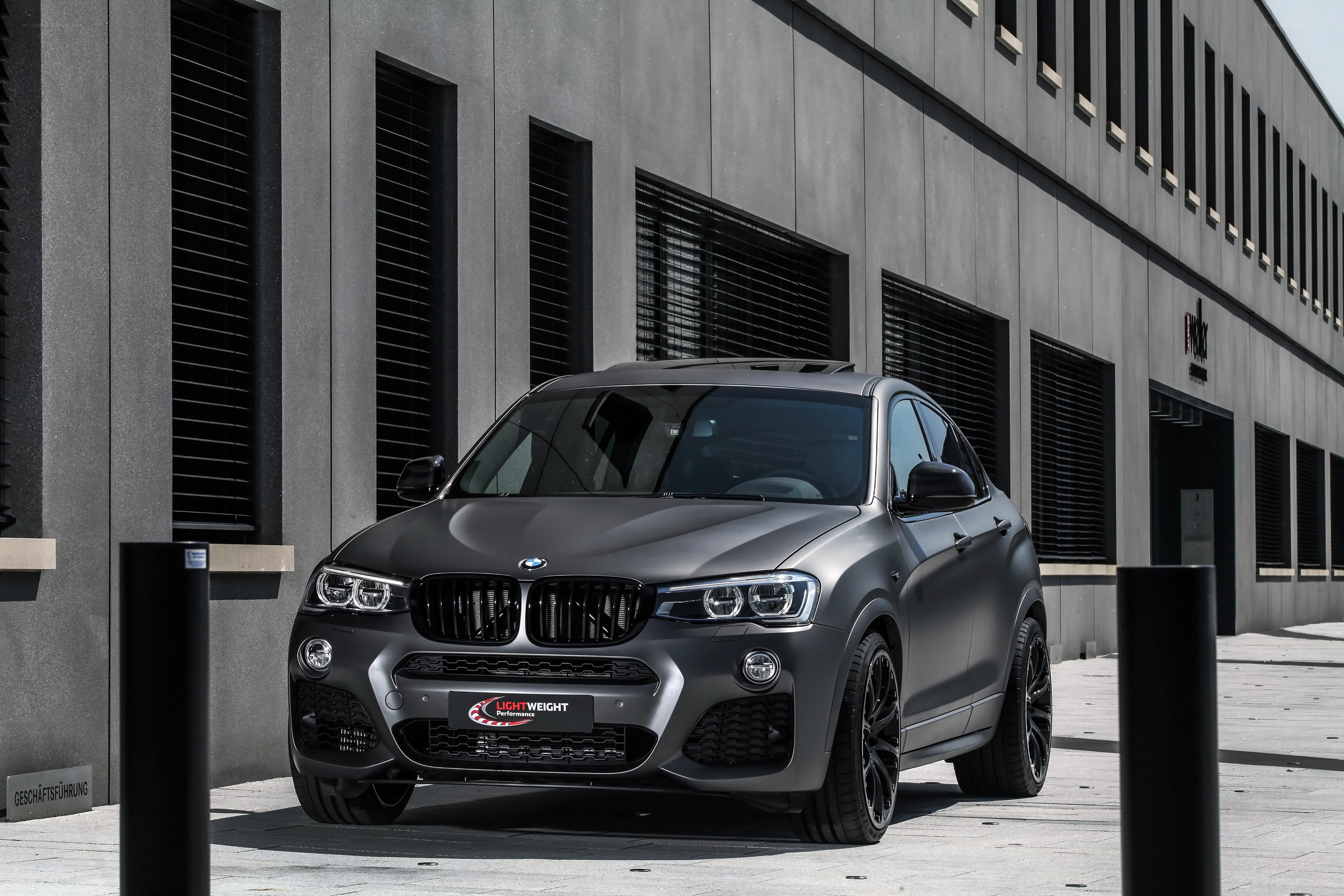 Matte gray BMW X4 parked outside