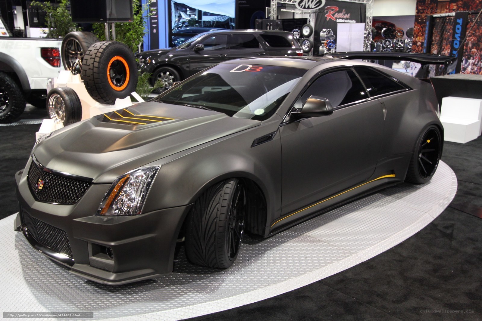 Matte gray Cadillac coupe on display