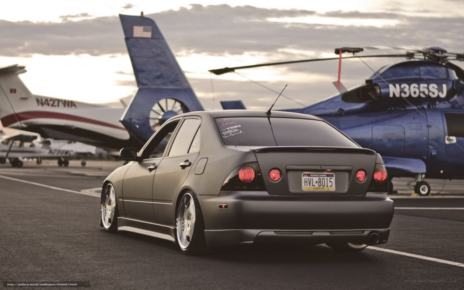 Matte gray car at airfield