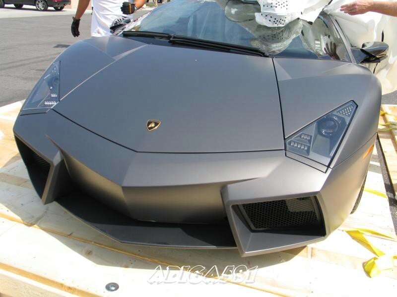 Matte gray Lamborghini on wooden pallet