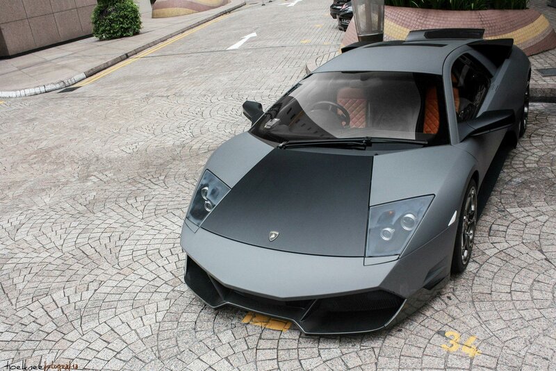 Matte gray Lamborghini parked