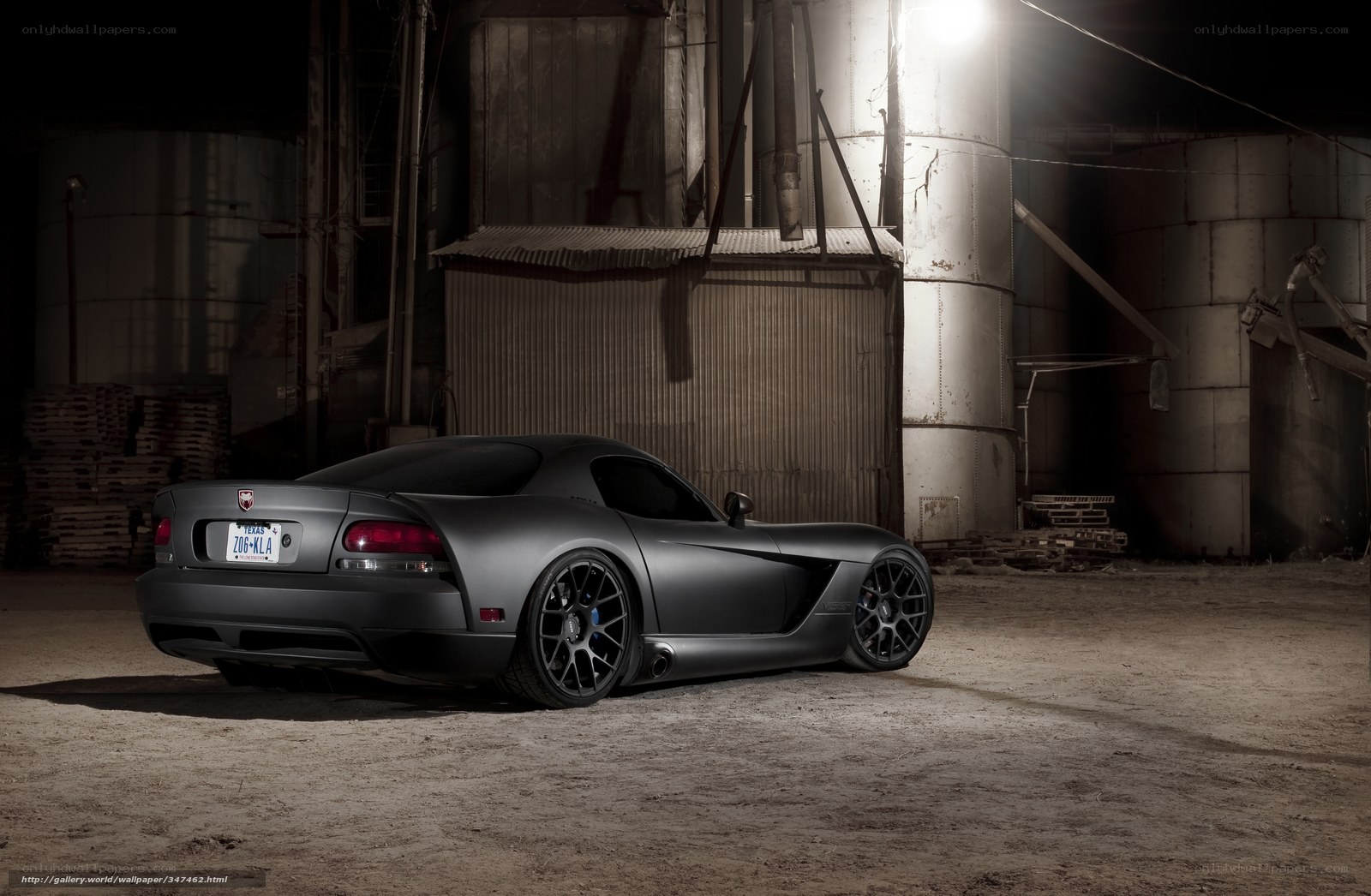 Matte gray sports car at night