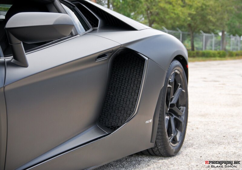 Matte Gray Sports Car — Calm, Afternoon, Photograph, Side Mirror