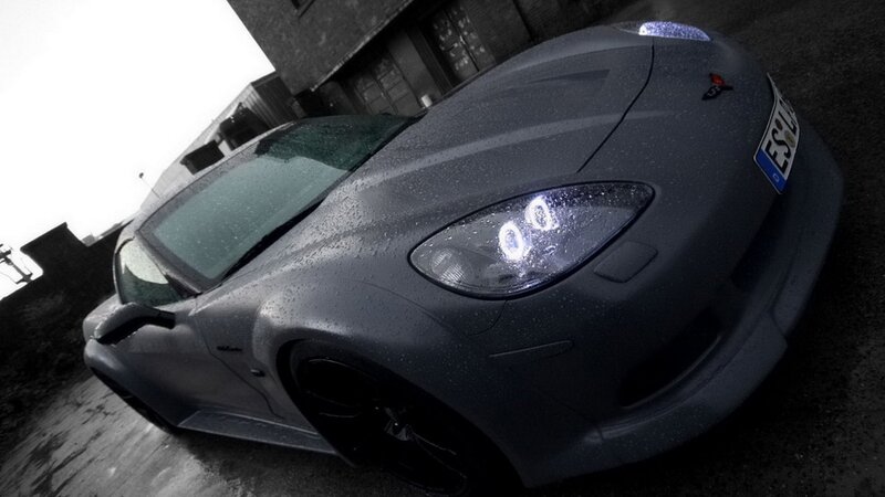 Matte Gray Sports Car — Dramatic, Photograph, Wet Surface