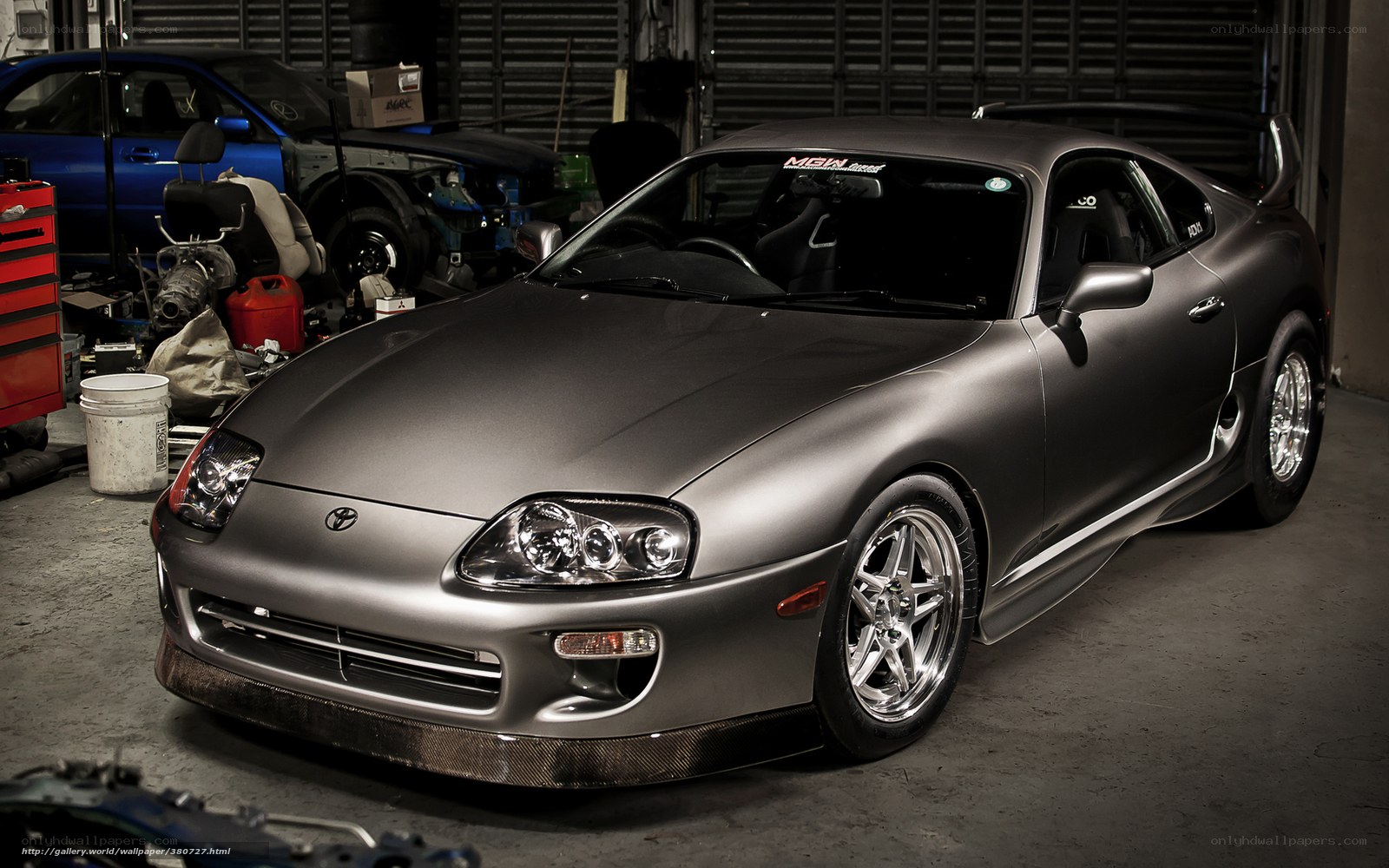 Matte gray sports car in garage