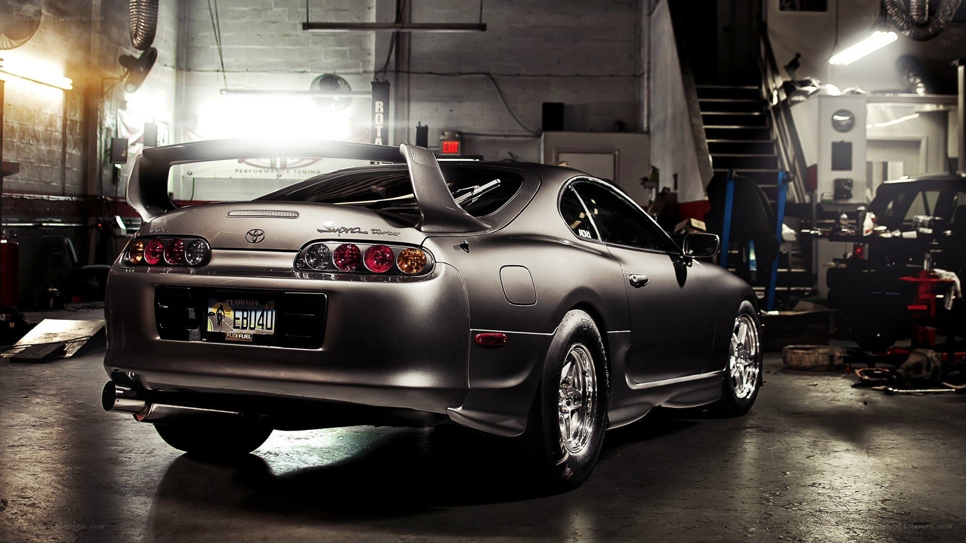 Matte gray Supra in garage