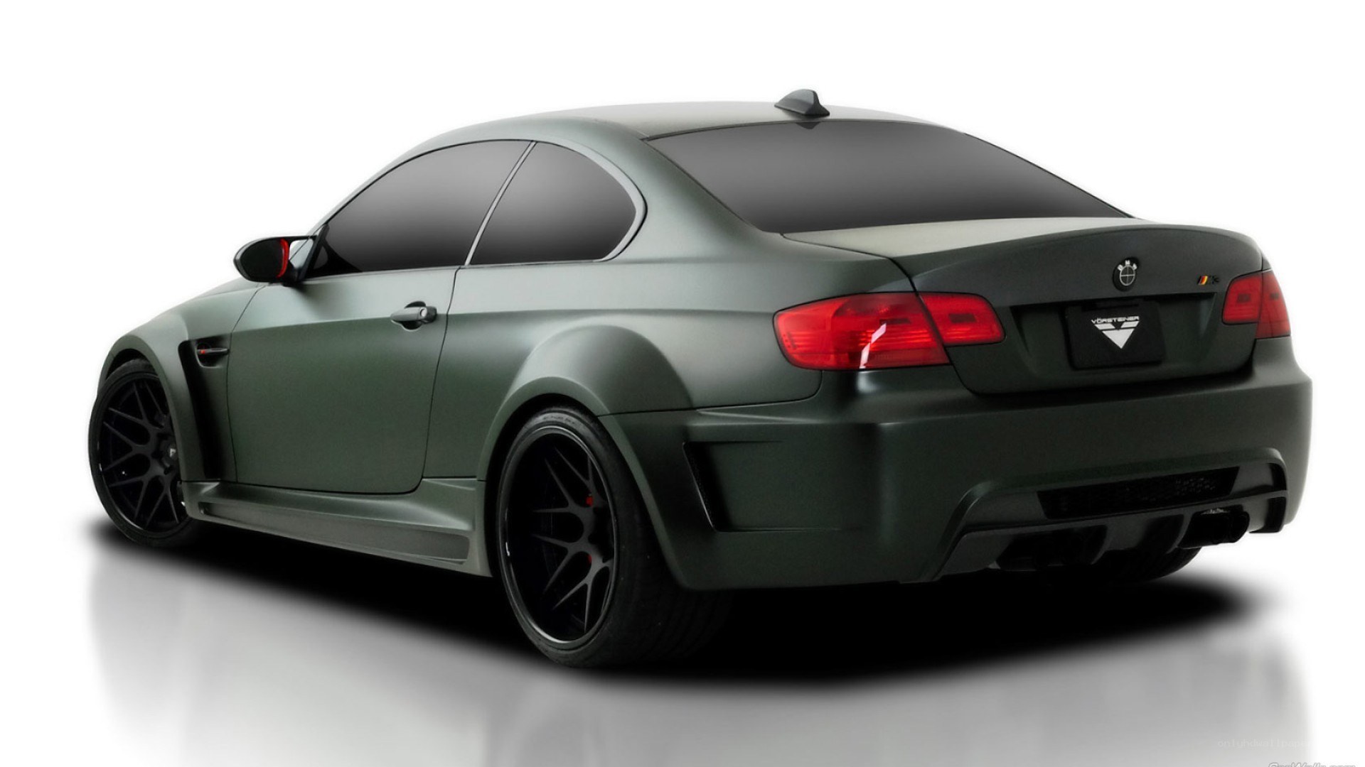 matte green modified BMW coupe