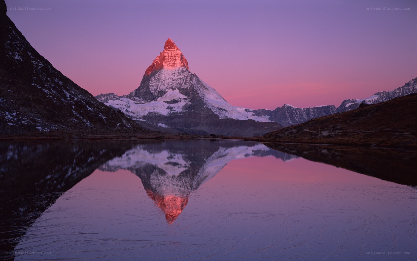 Matterhorn at dawn with lake reflection