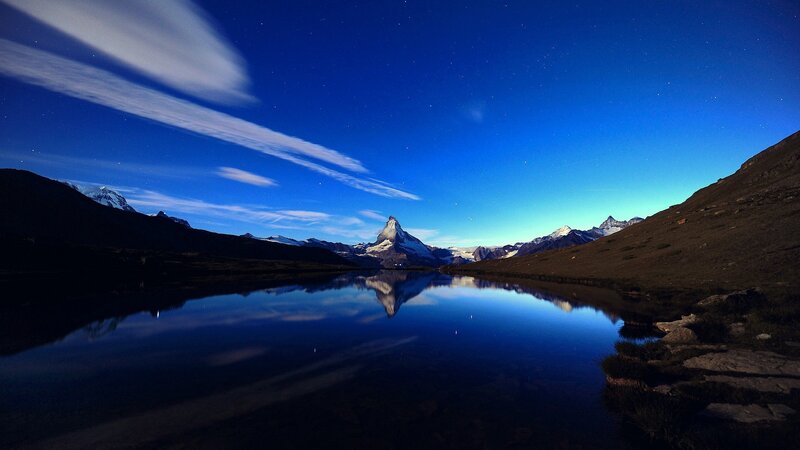 Matterhorn at night with lake reflection