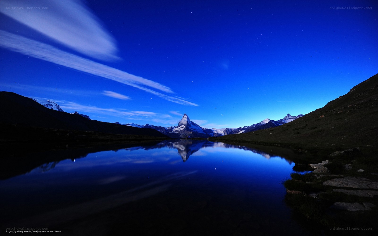 Matterhorn at night with lake reflection