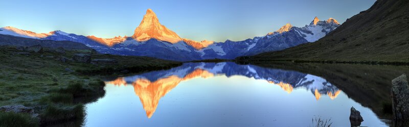 Matterhorn at sunrise reflected in lake