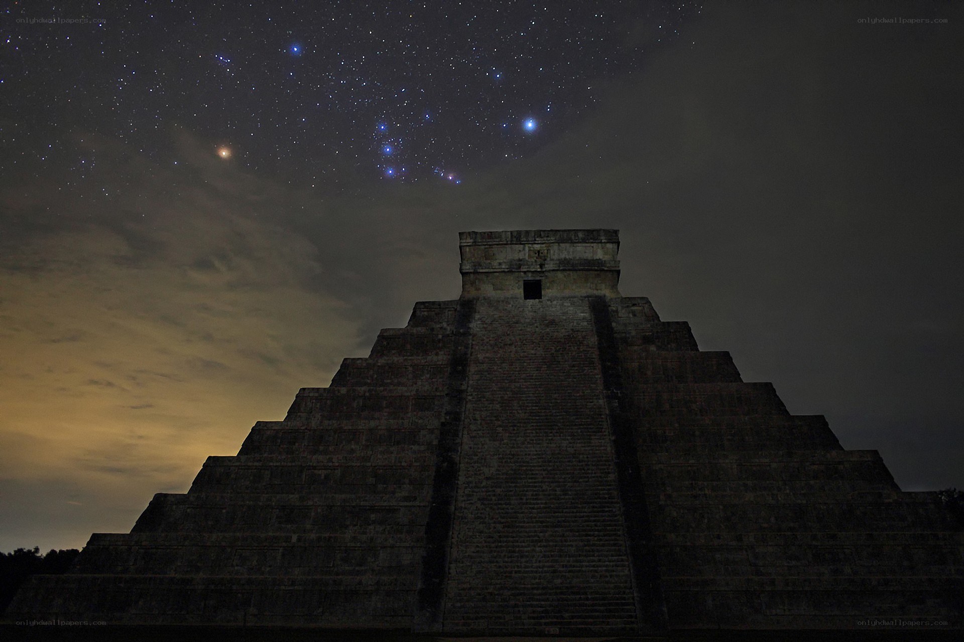 Mayan pyramid under starry sky