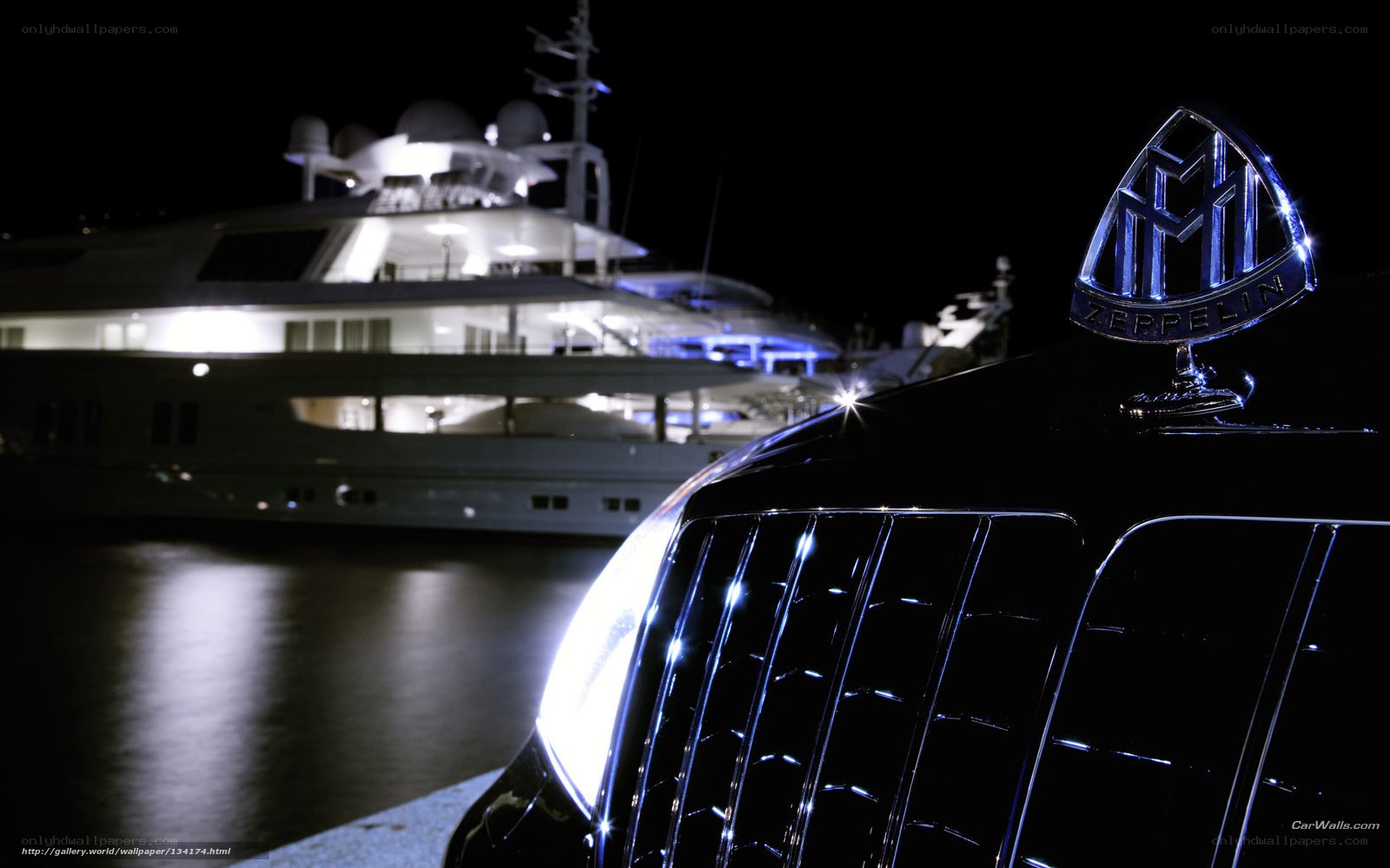 Maybach and yacht at night