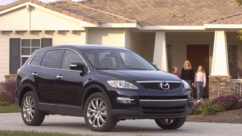 Mazda CX-9 in front of house