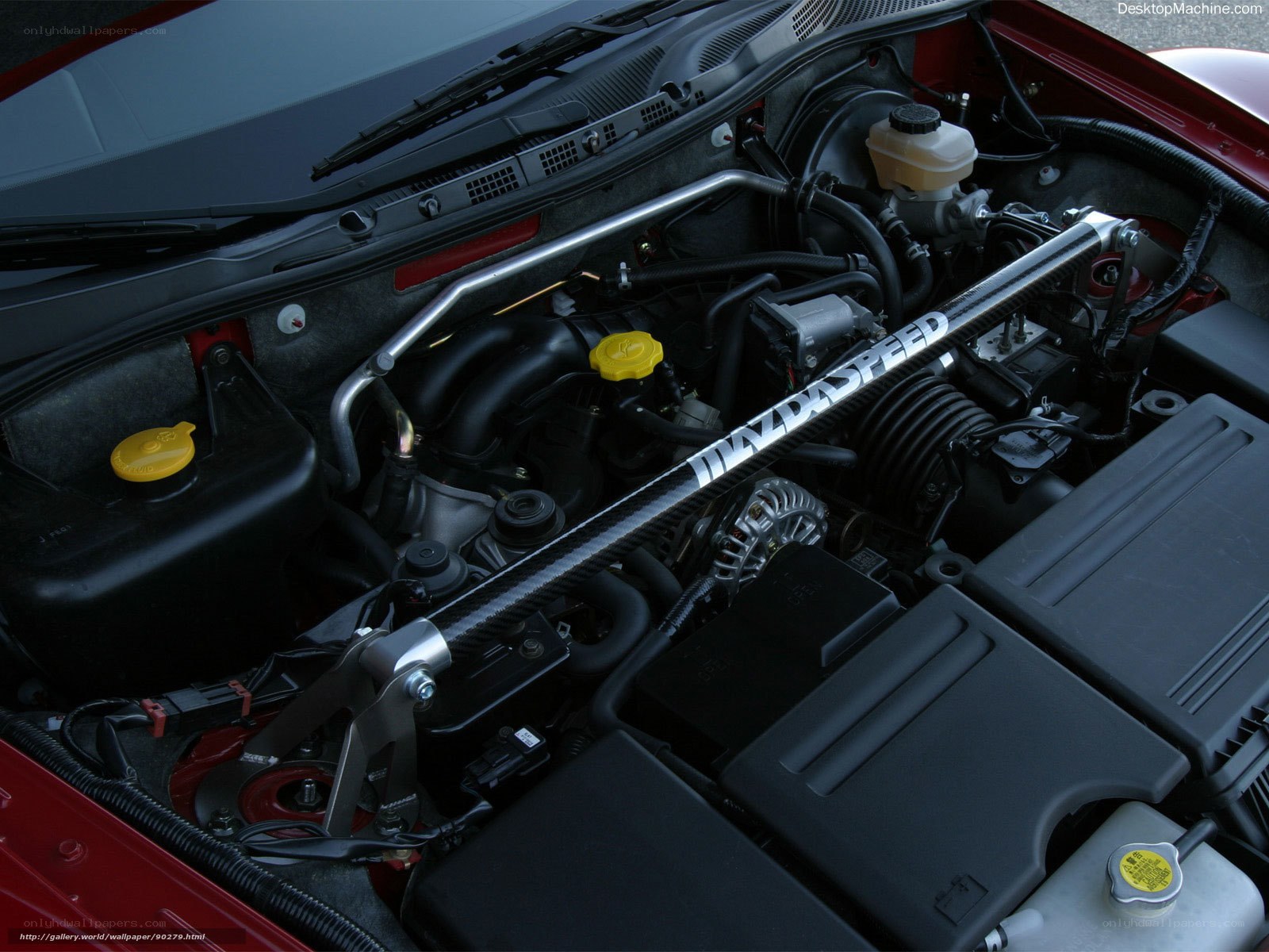 Mazda engine bay with strut bar
