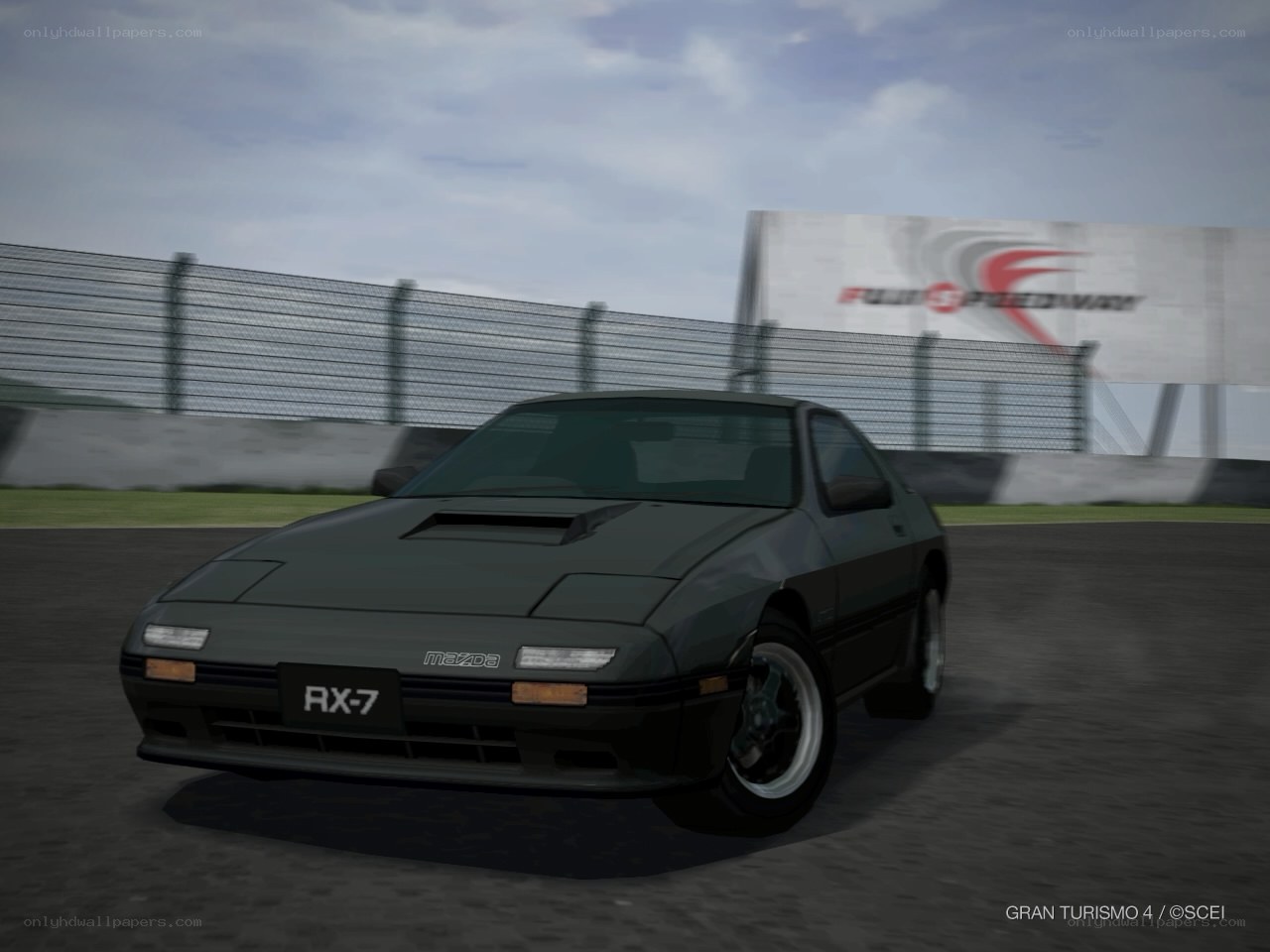 Mazda RX-7 on a racetrack
