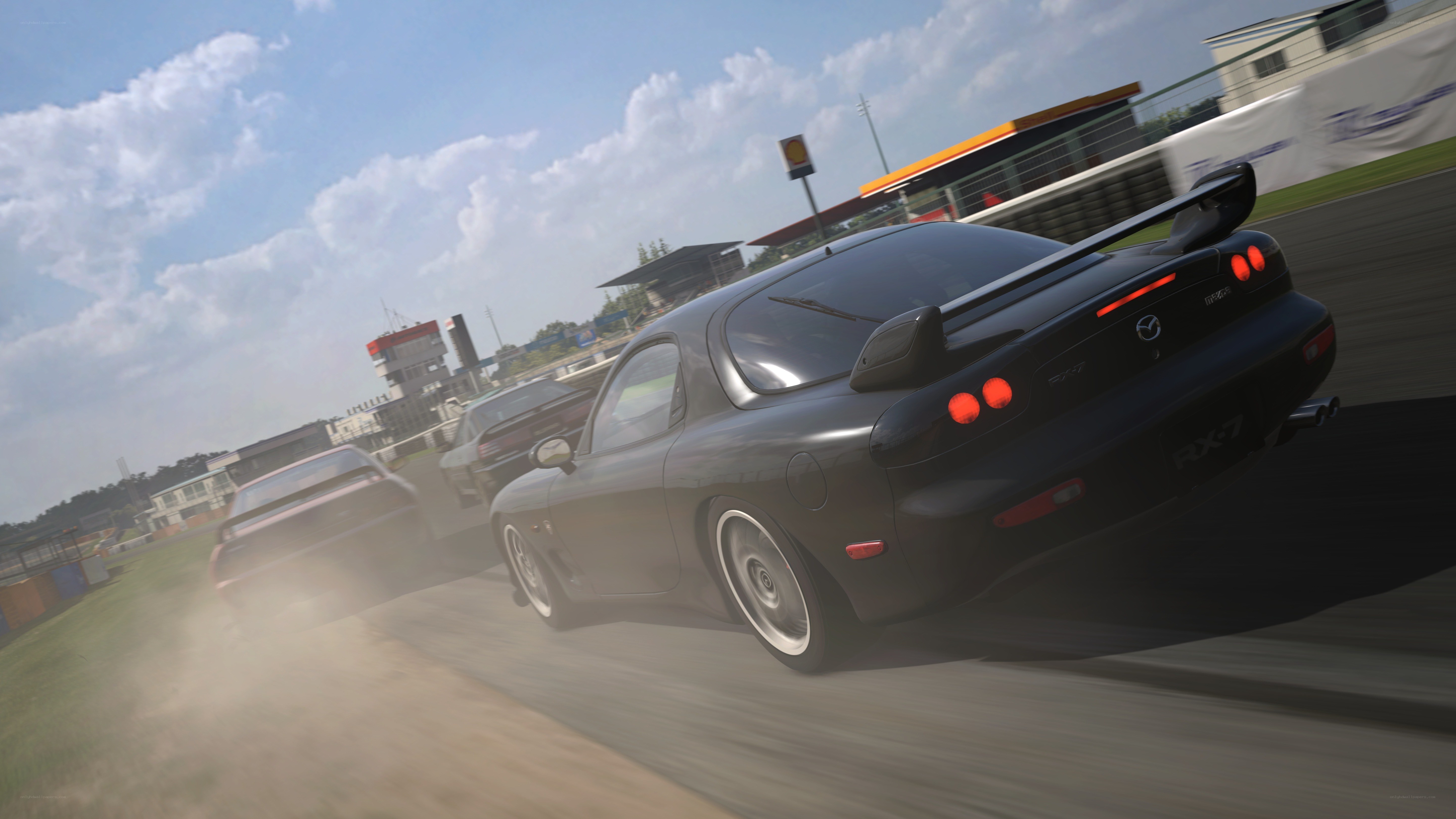 Mazda RX-7 racing on track