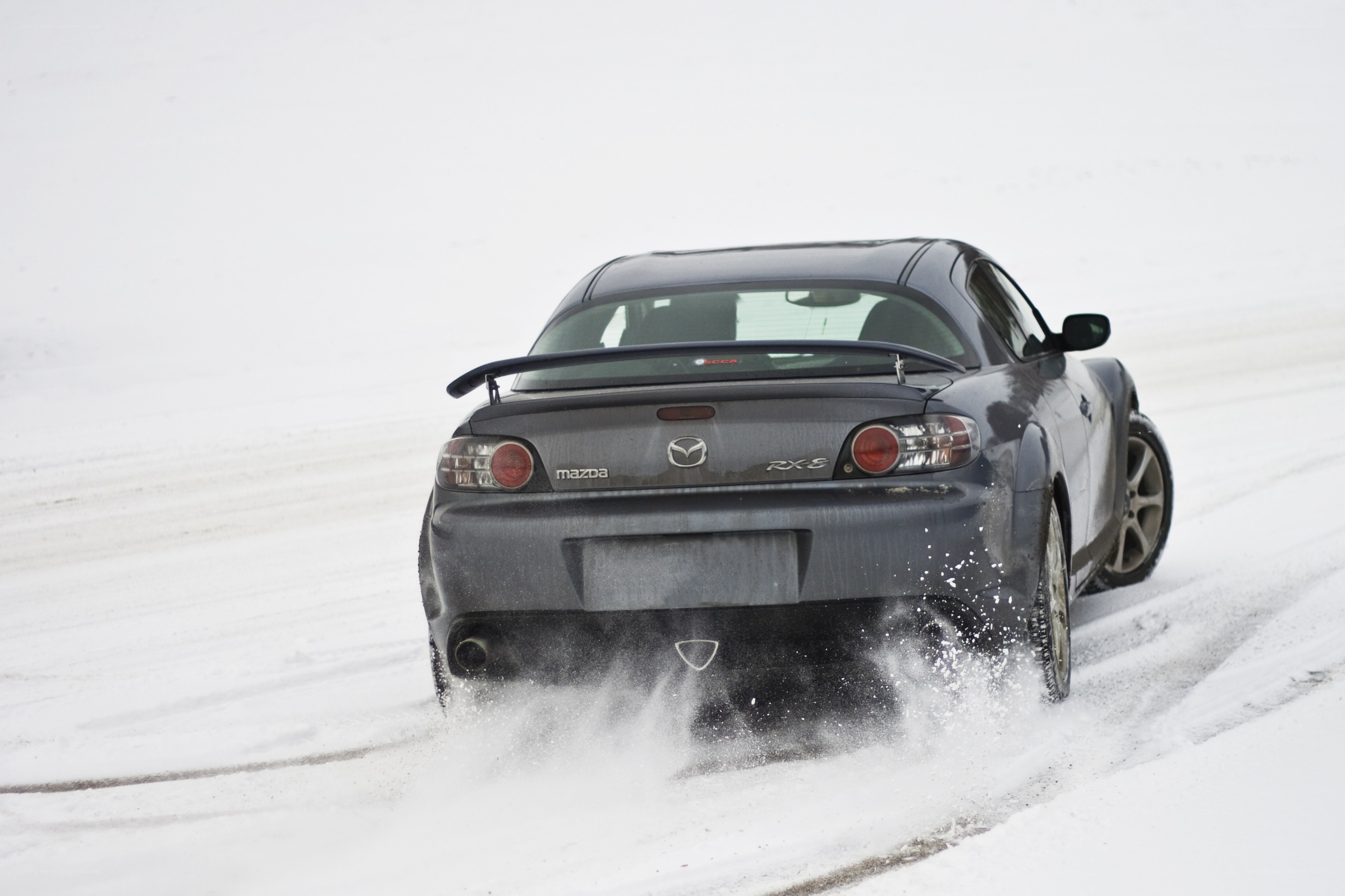 Mazda RX-8 drifting in snow