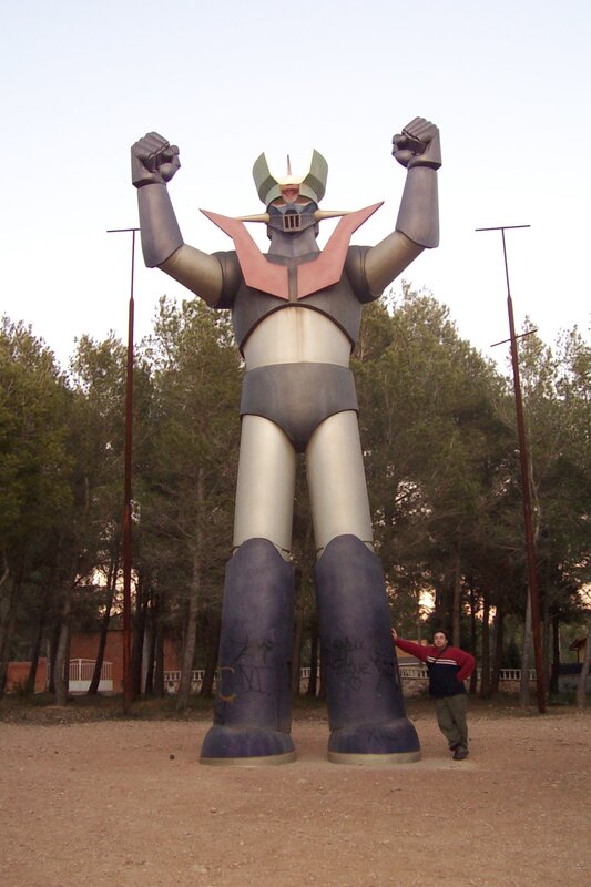 Mazinger Z statue with visitor