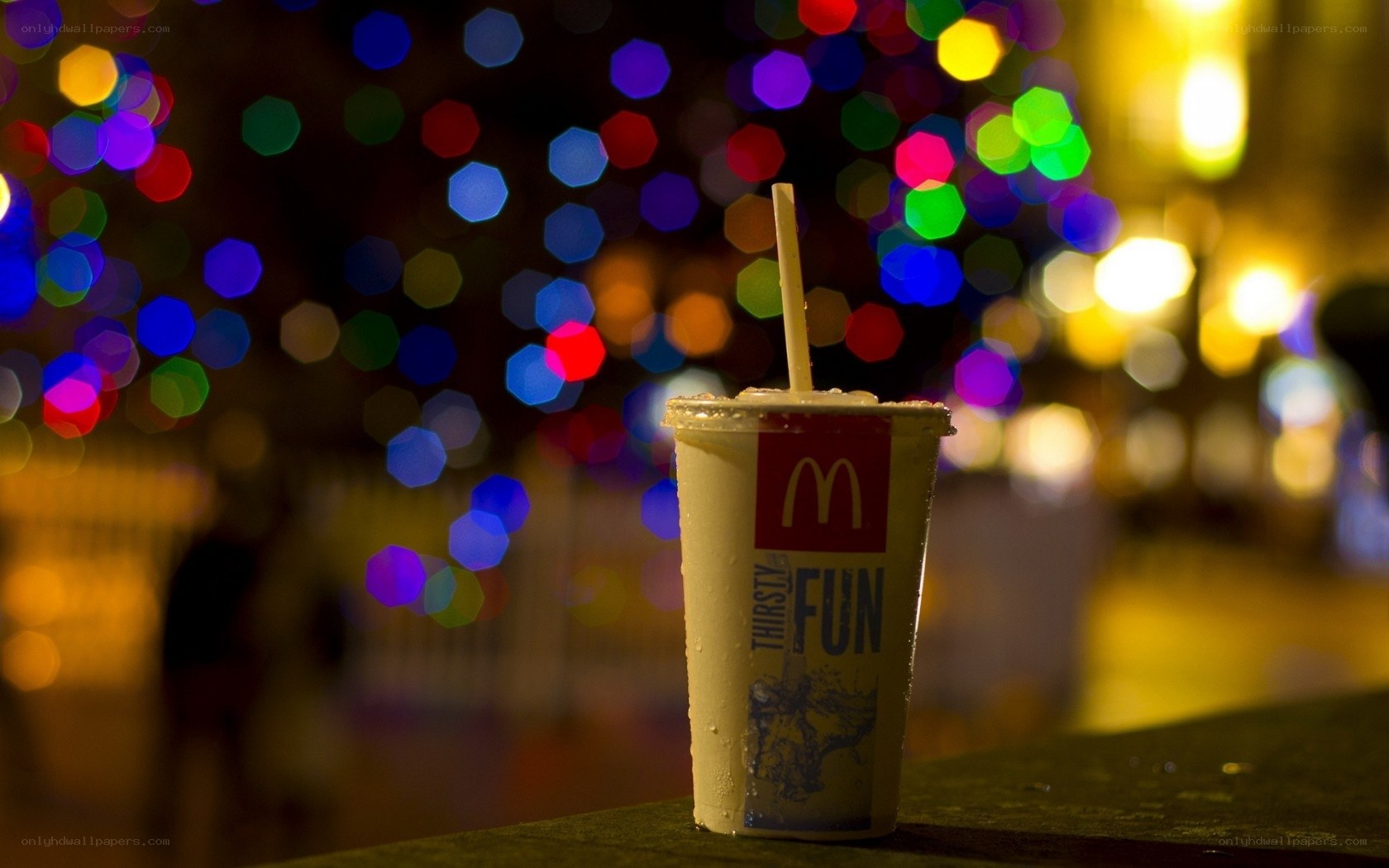 McDonald's cup with festive lights
