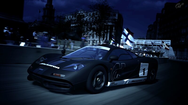 McLaren F1 race car at night