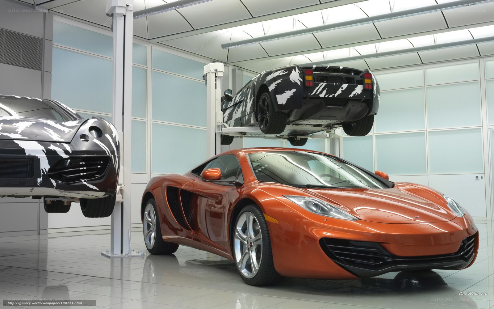 McLaren sports cars in a factory