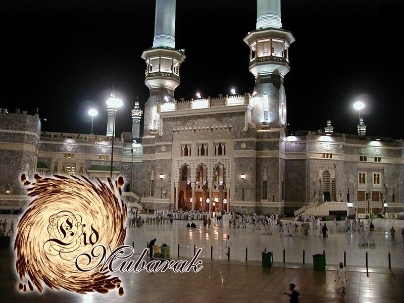 Mecca at night with Eid Mubarak