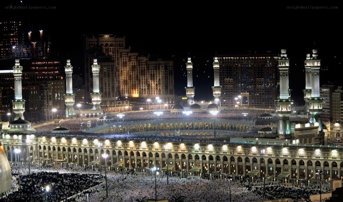 Mecca at night with pilgrims