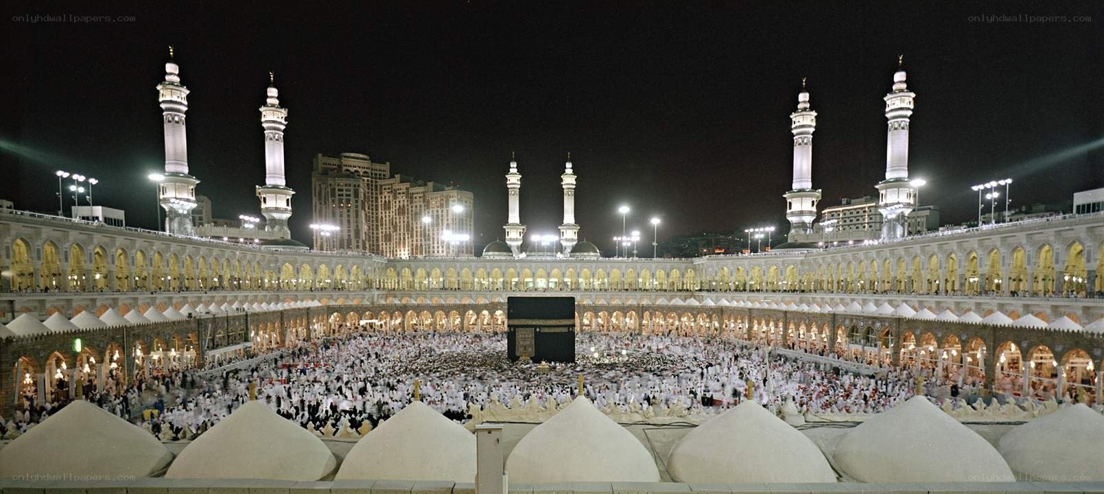Mecca at night with pilgrims