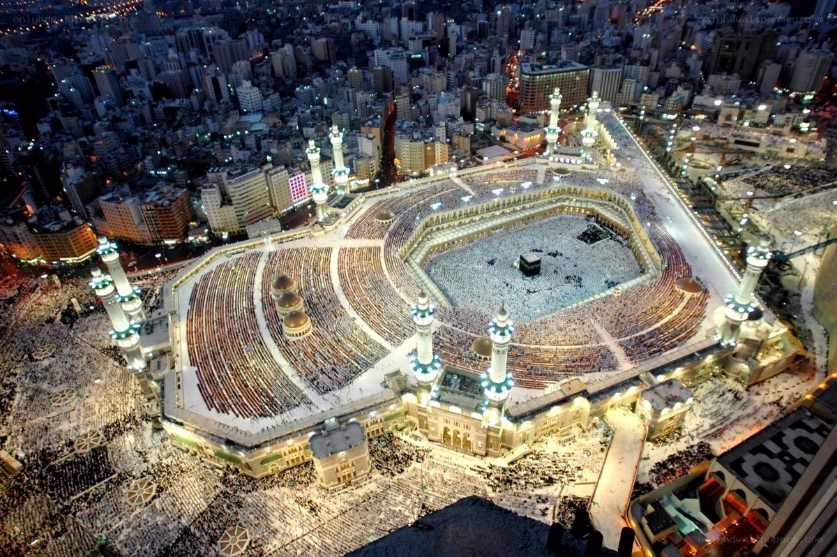 Mecca at night with pilgrims