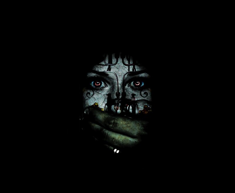 Mechanical Face with Glowing Eyes — Black