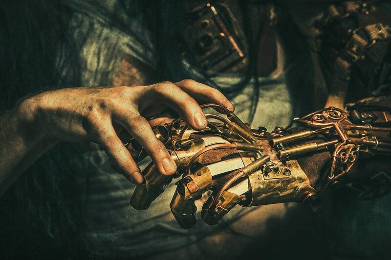 Mechanical Hand and Human Hand