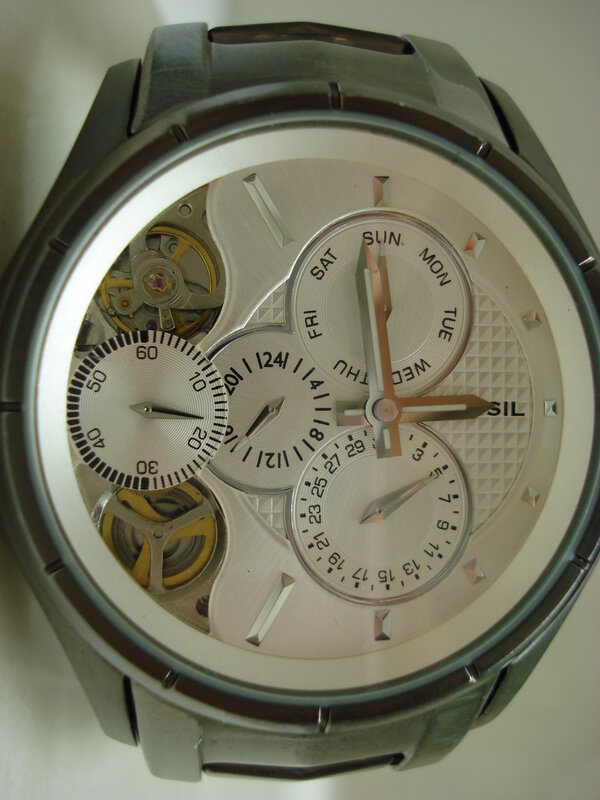 mechanical watch with skeleton dial