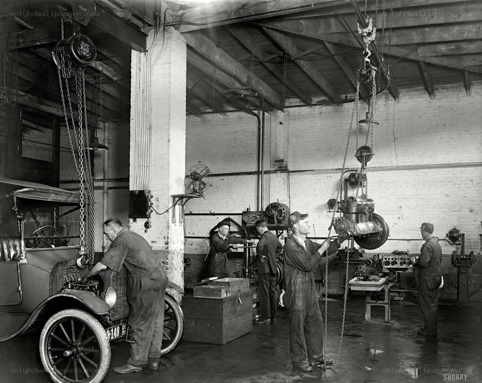 Mechanics working in a garage