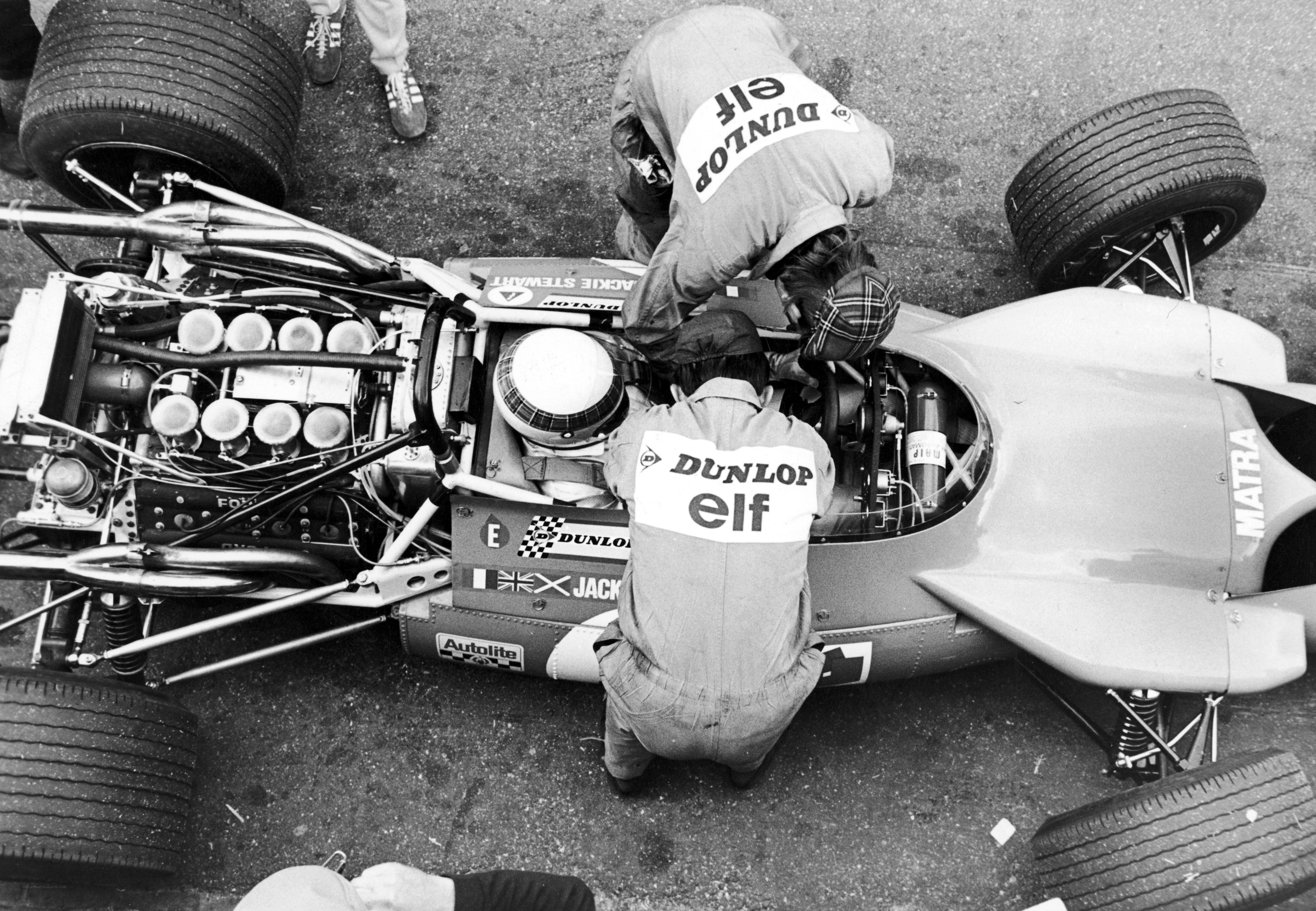 Mechanics working on a race car
