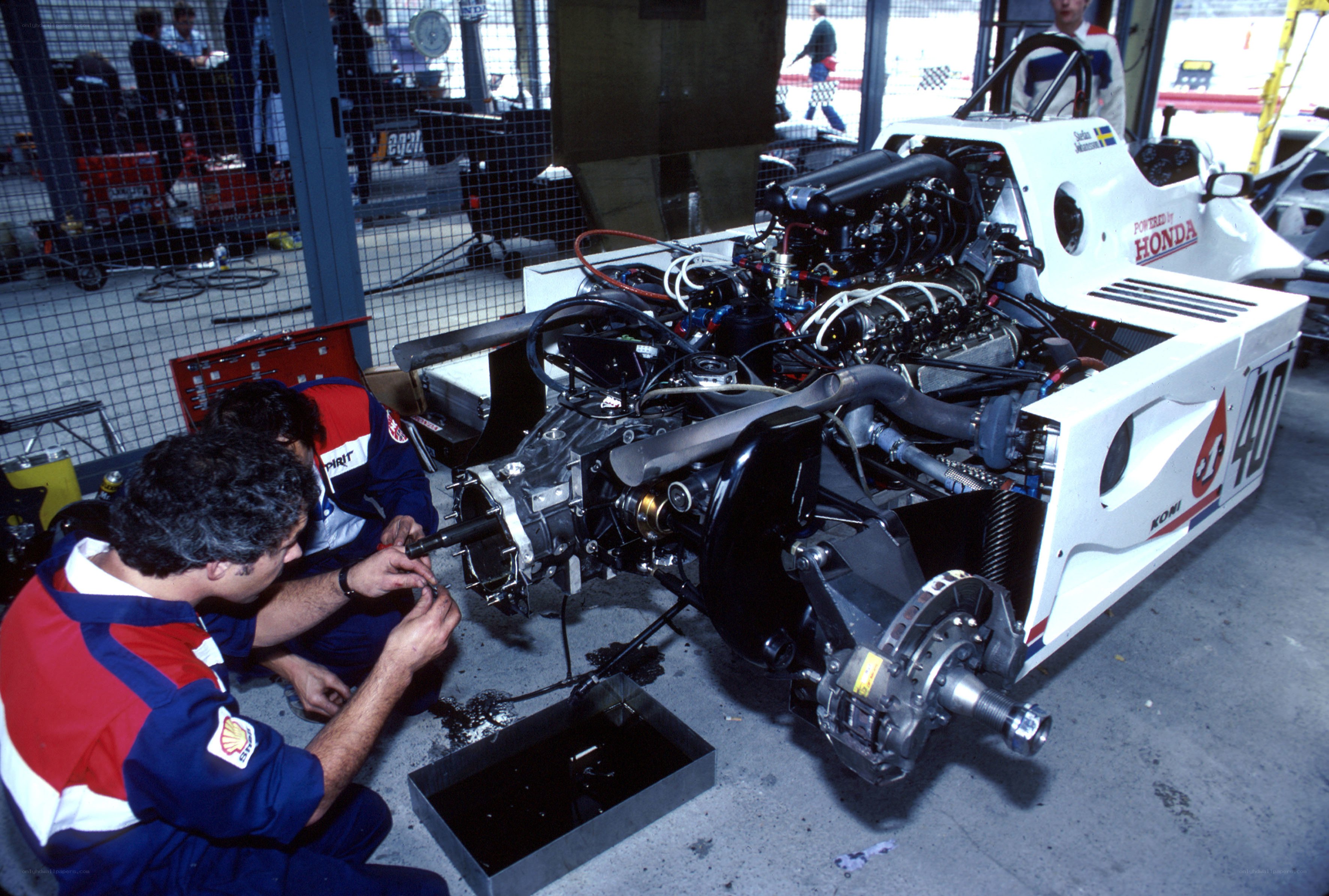 Mechanics working on race car