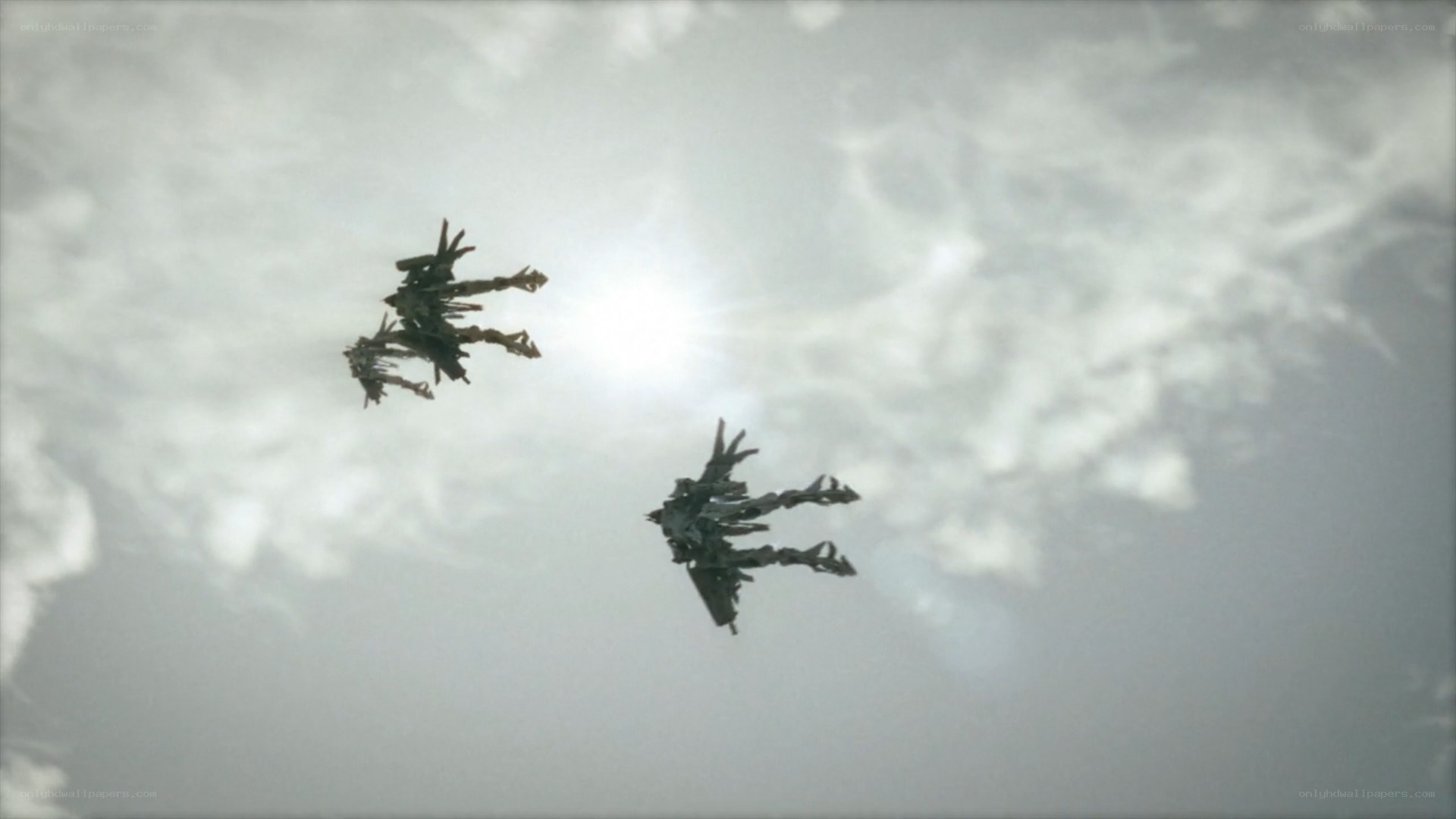 mechs flying in cloudy sky