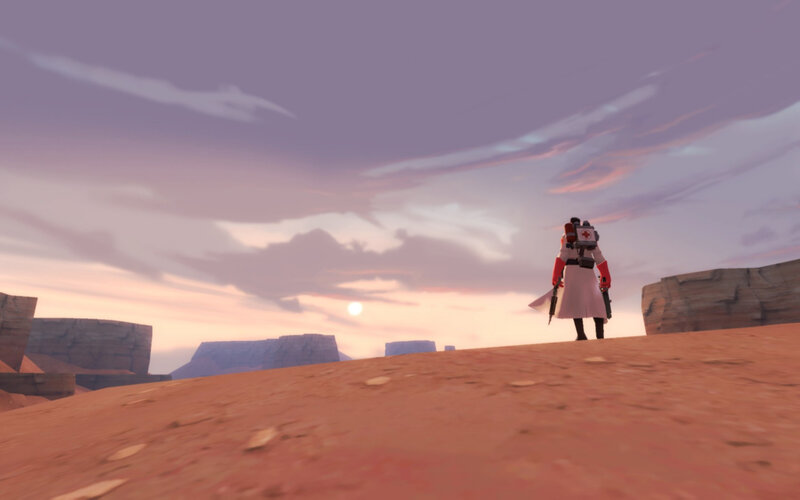 Medic in desert at sunset