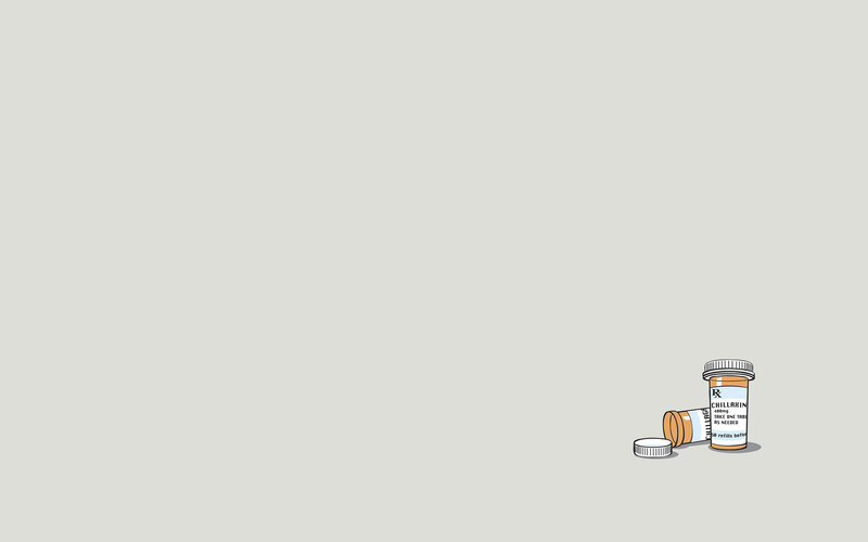 Medicine bottles on gray background