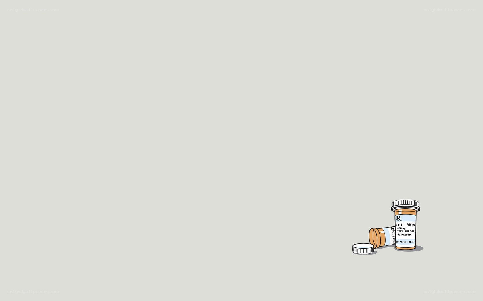 Medicine bottles on gray background