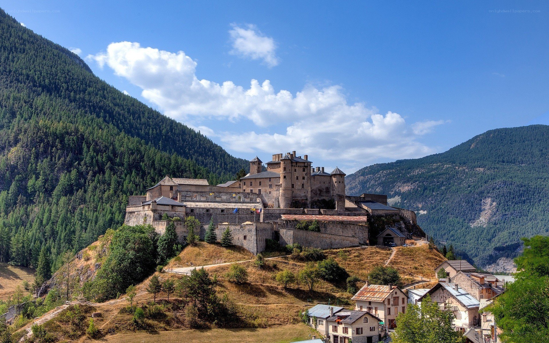 Medieval castle in mountain valley