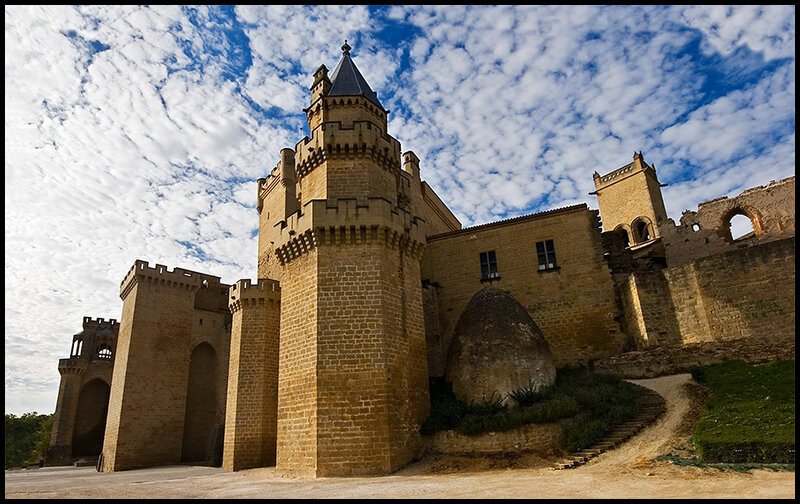 Medieval castle under cloudy sky