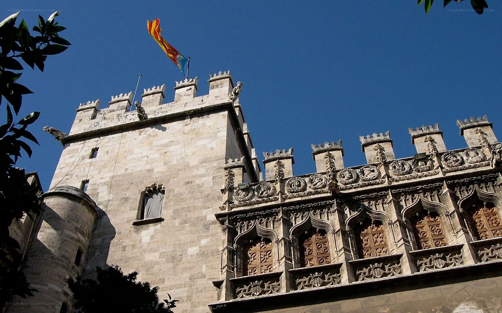 Medieval castle with Catalan flag