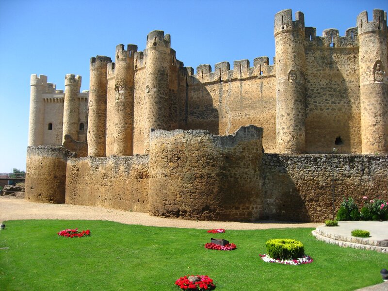 Medieval castle with flower beds