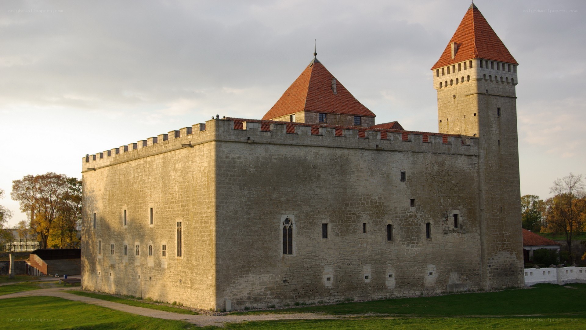 Medieval castle with red-roofed towers