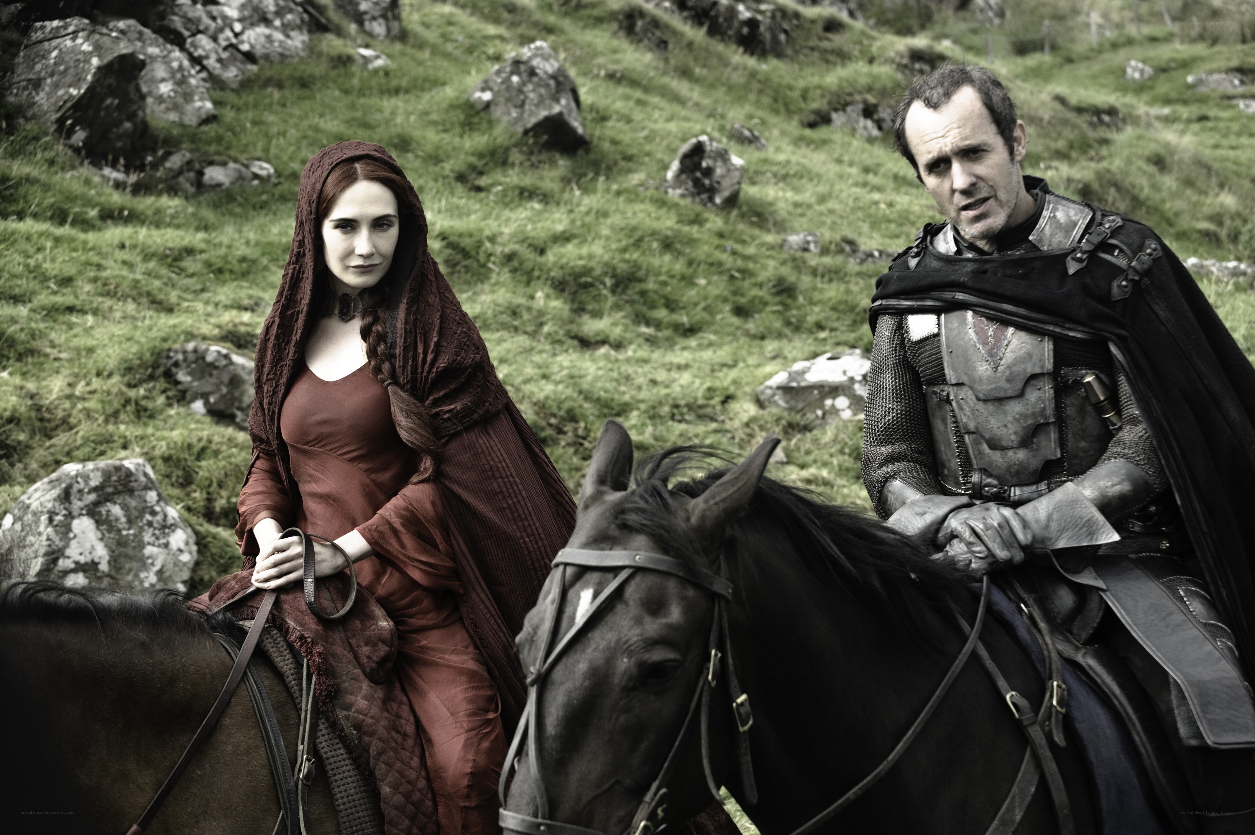 Medieval couple on horseback