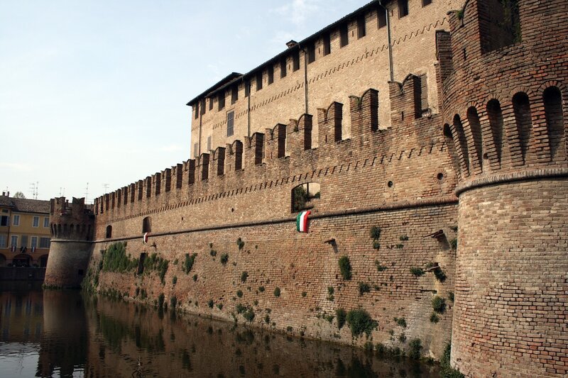 Medieval fortress wall by a river