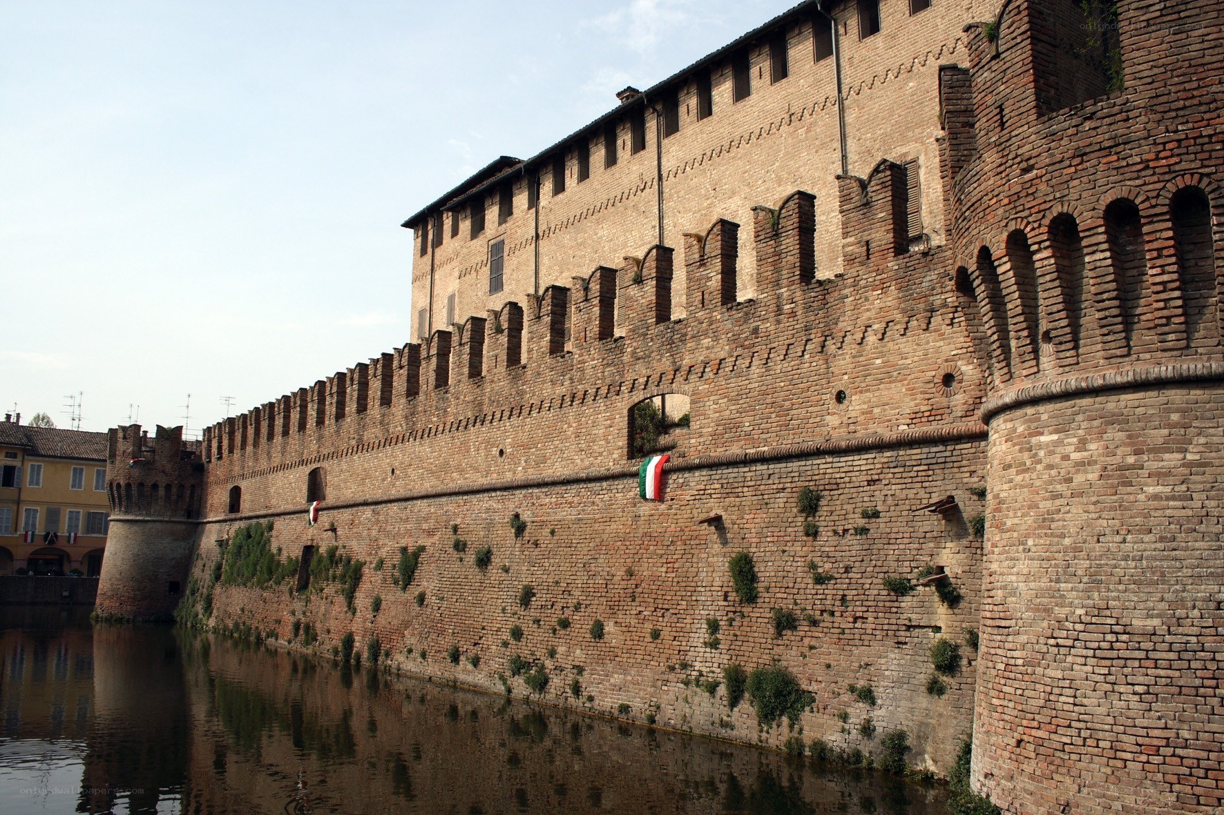 Medieval fortress wall by a river