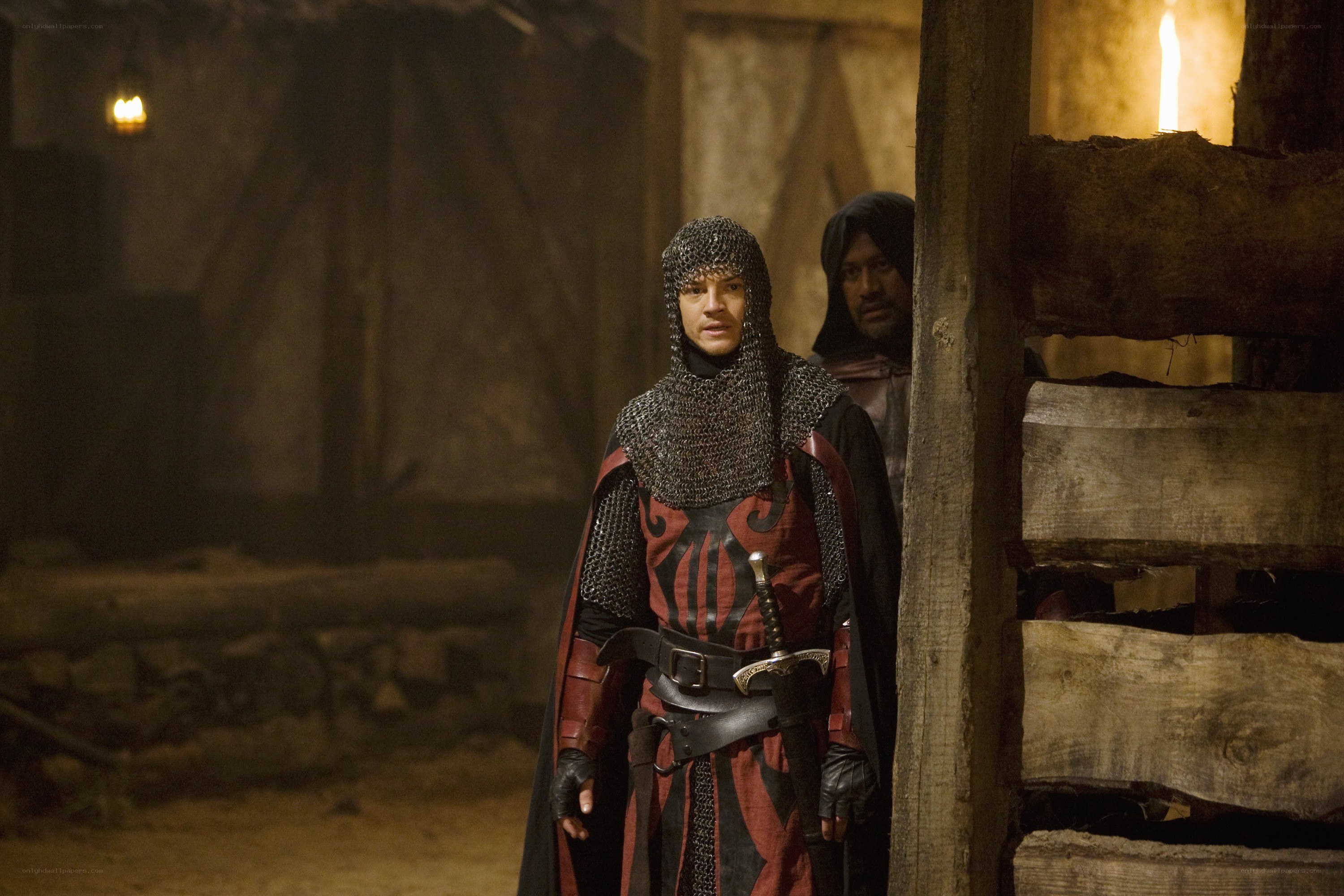 Medieval knight in a dimly lit hall